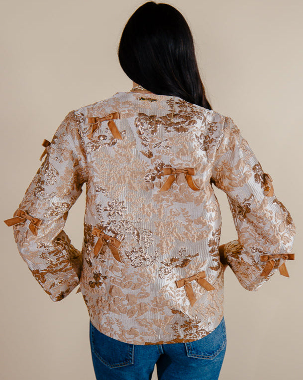 Sandhya Garg Agra metallic gold jacquard jacket — showing how gold woven jacquard fabric catches light for evening and occasion wear