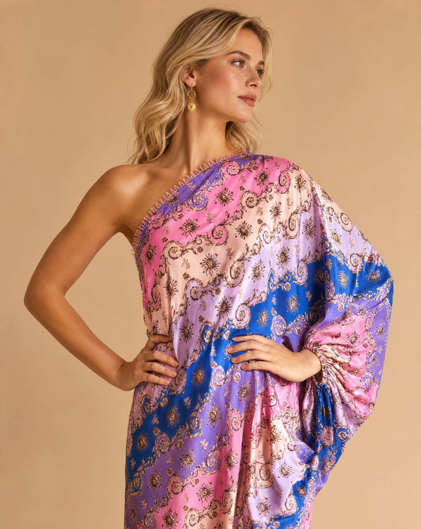 Close-up of asymmetric one-shoulder neckline on the Carolina pink printed maxi dress showing the single balloon sleeve construction